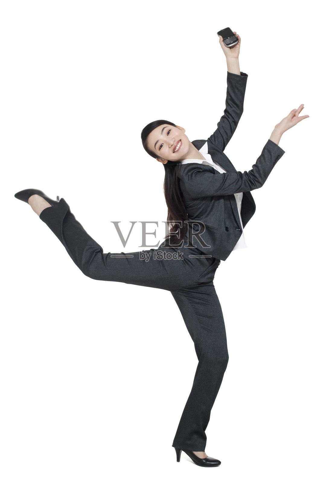 商务女士展示手机照片摄影图片