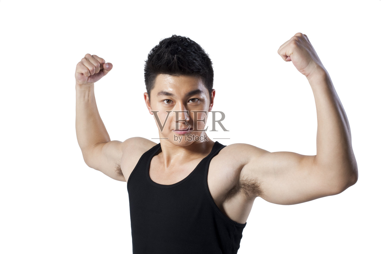 青年男子显示强壮肌肉照片摄影图片