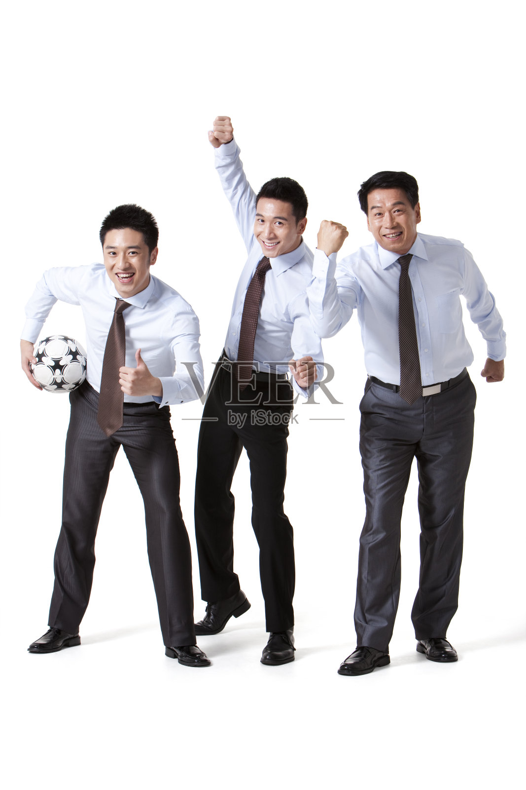 商务男士和足球照片摄影图片