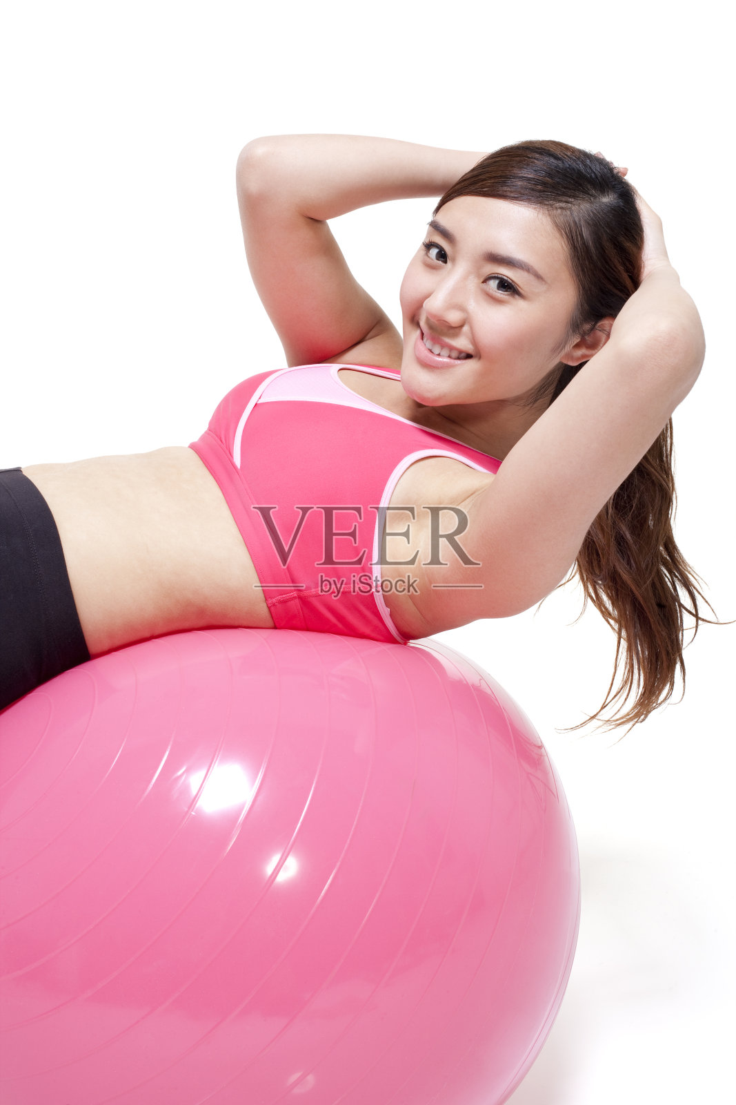 青年女子和健身球照片摄影图片