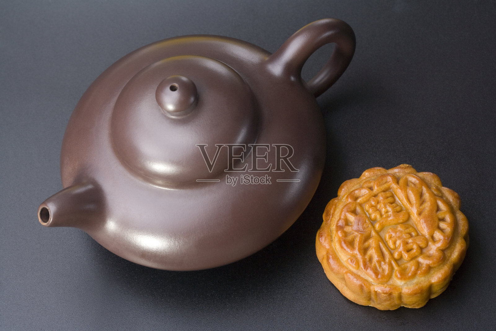 茶壶和月饼照片摄影图片