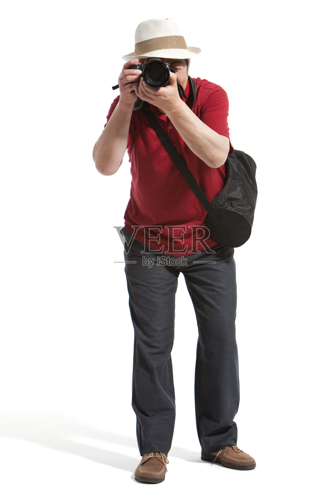 老年男子和相机照片摄影图片