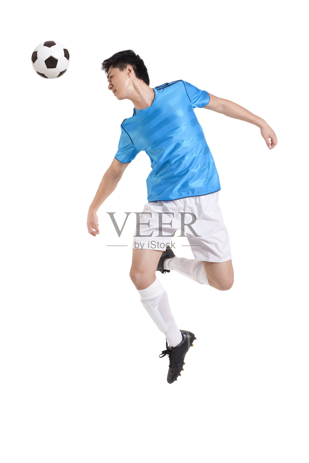 足球运动员跳跃照片摄影图片
