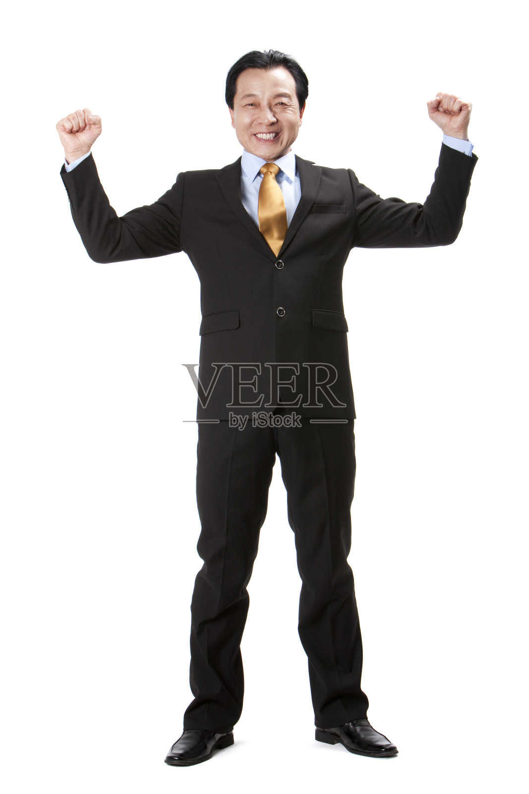 中年商务男士加油照片摄影图片