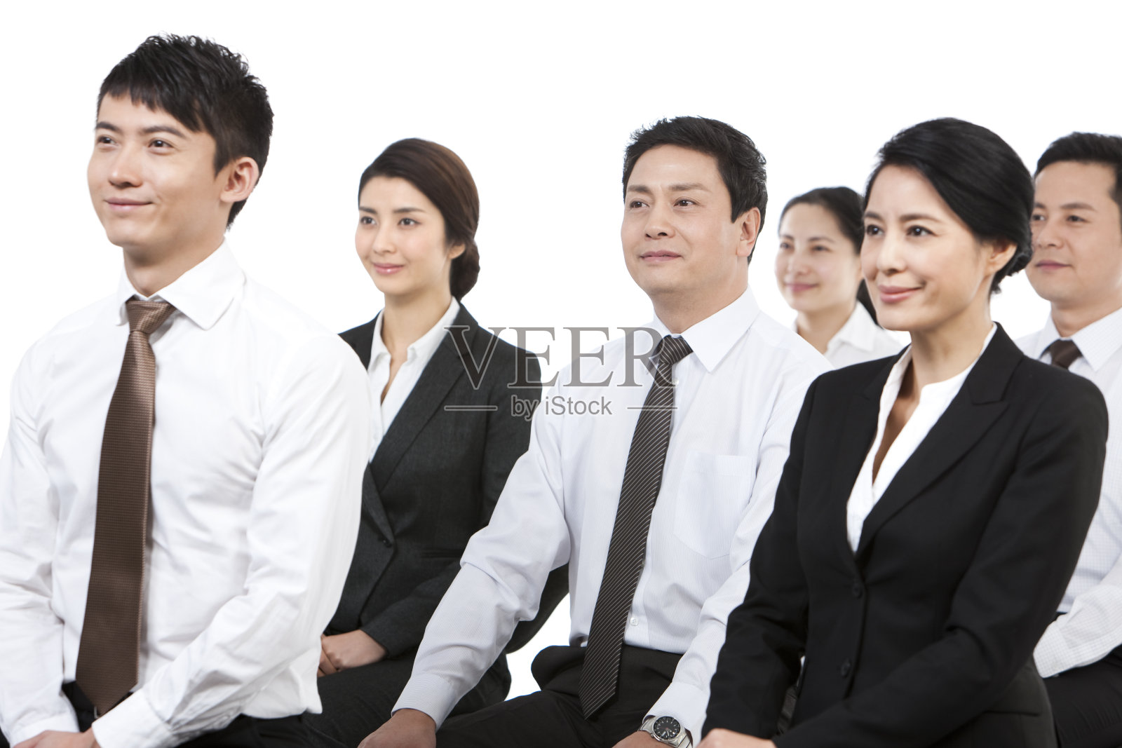 商务人士在会议中照片摄影图片