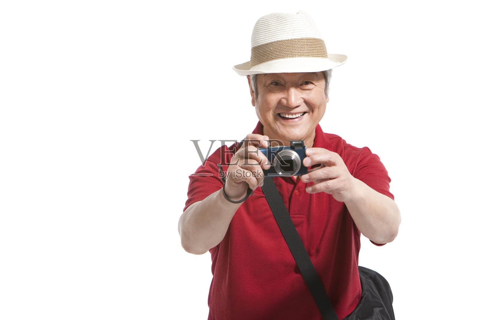 老年男子和相机照片摄影图片