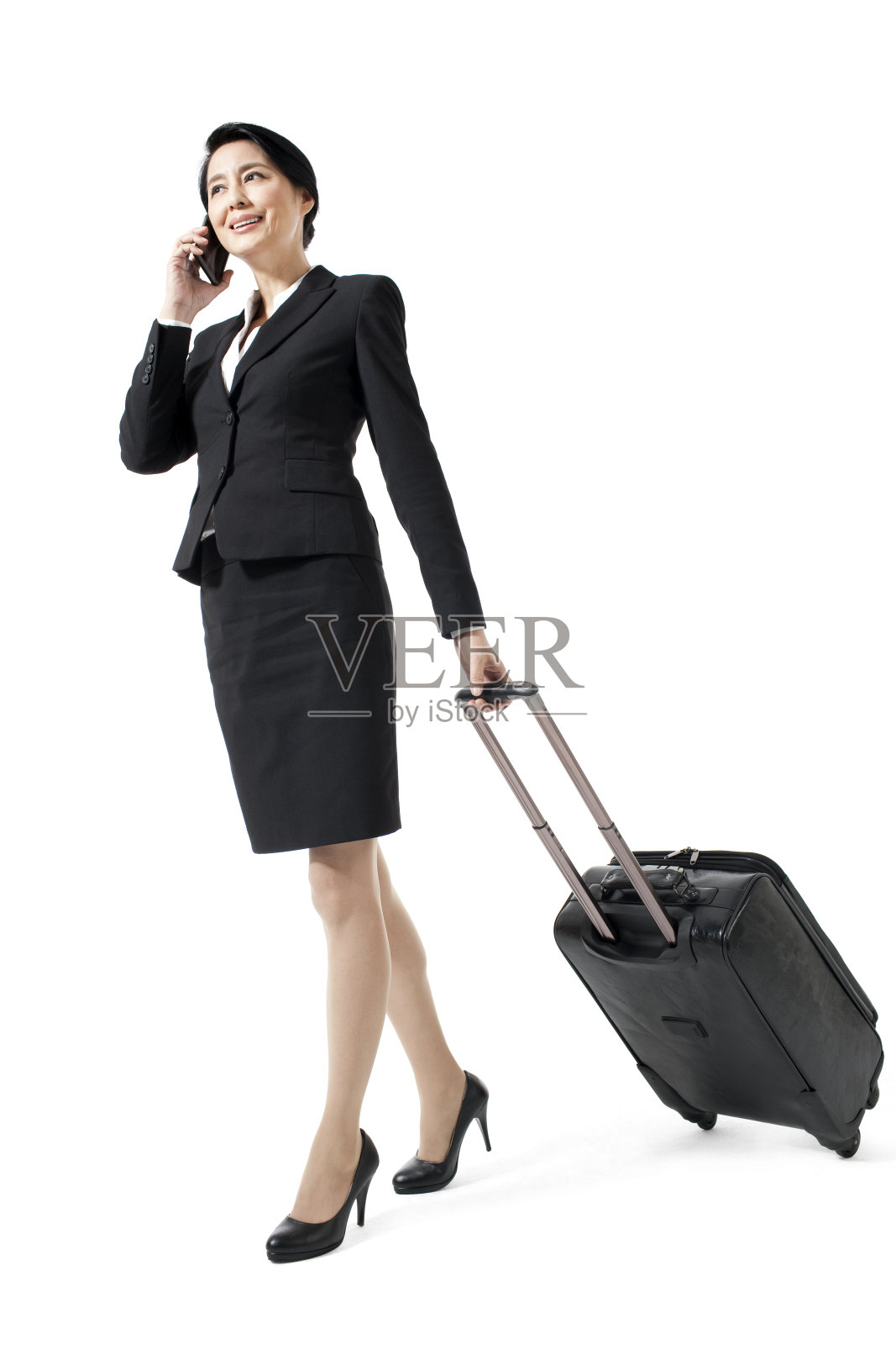 旅行的商务女士打电话照片摄影图片