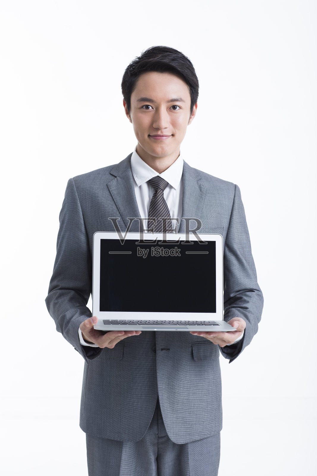 商务男士展示笔记本电脑照片摄影图片