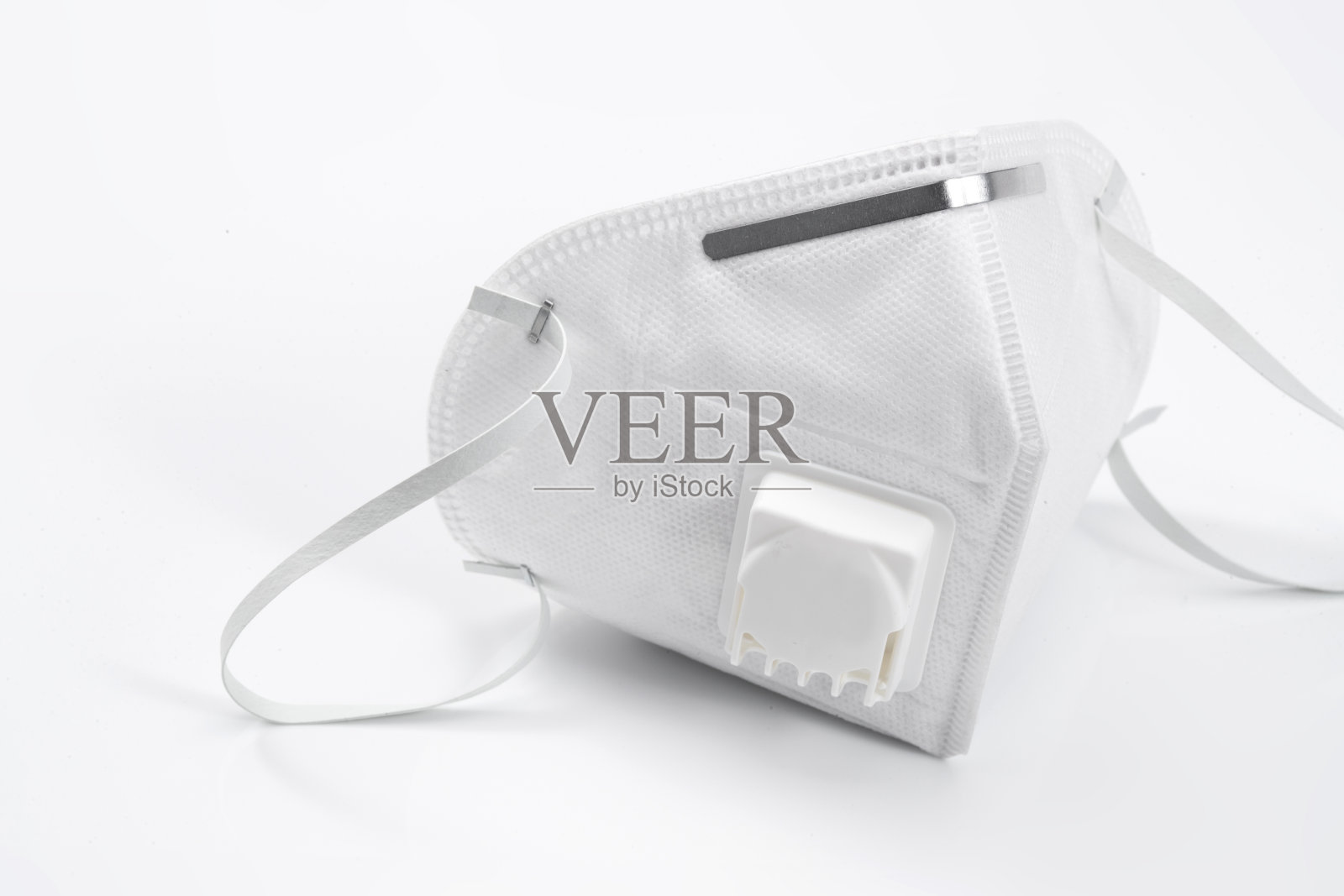 折叠式N95口罩照片摄影图片