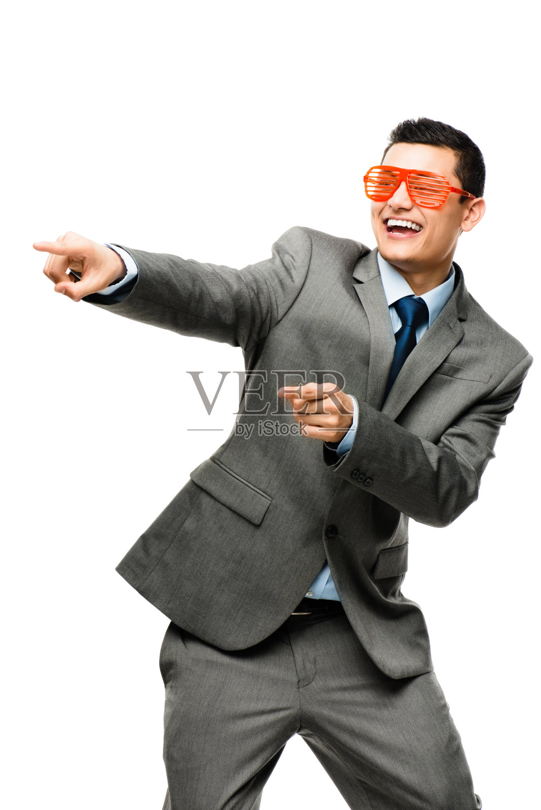 在摄影棚背景下拍摄的一个亚洲商人照片摄影图片