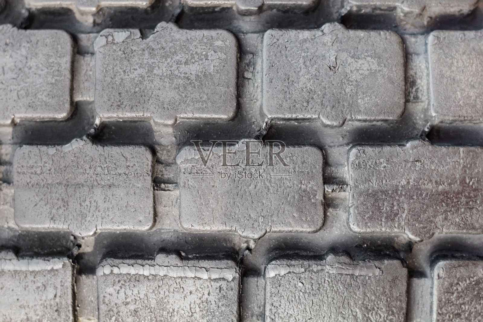 灰色金属装甲图案。照片摄影图片