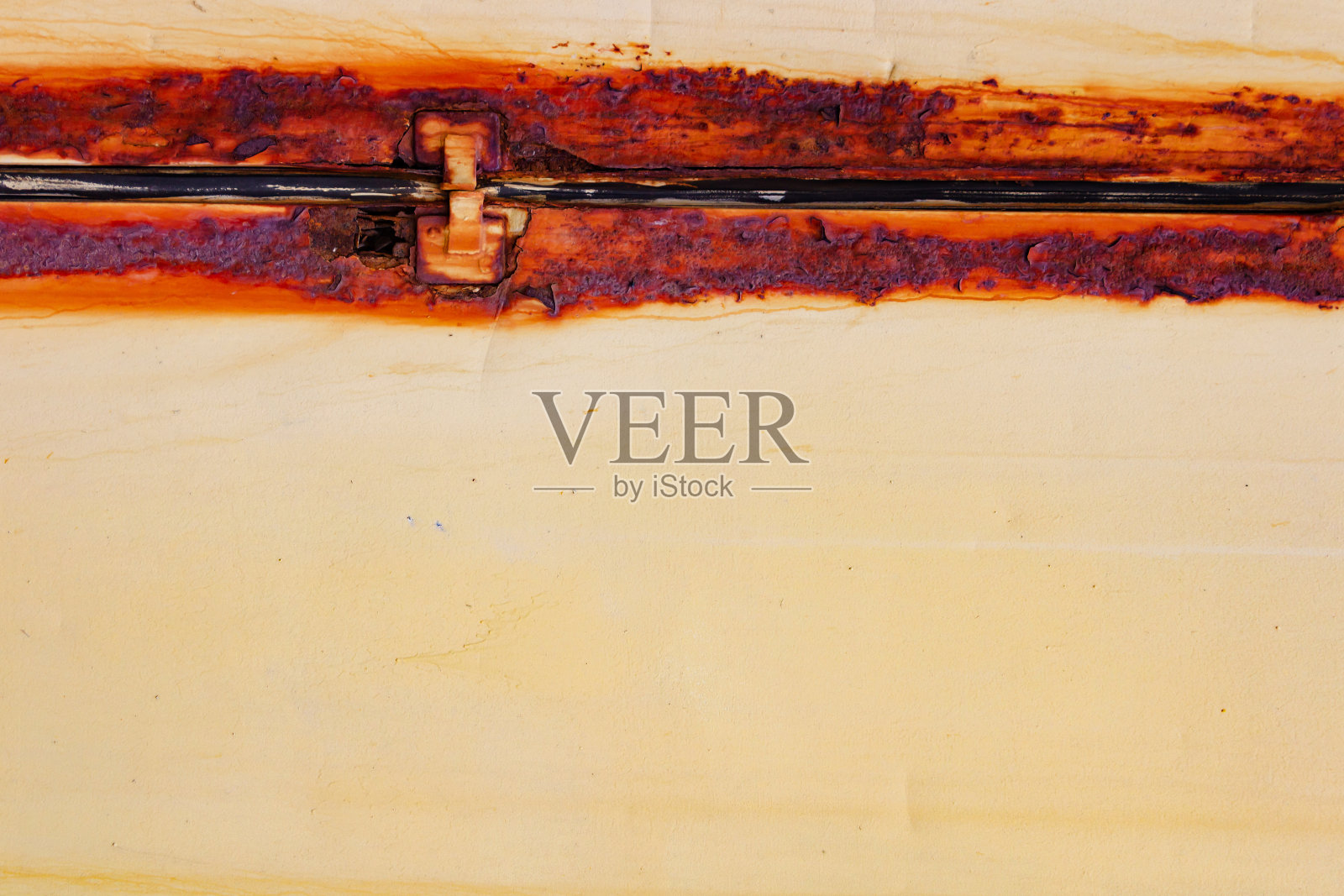 生锈的金属橙色的面板纹理。照片摄影图片