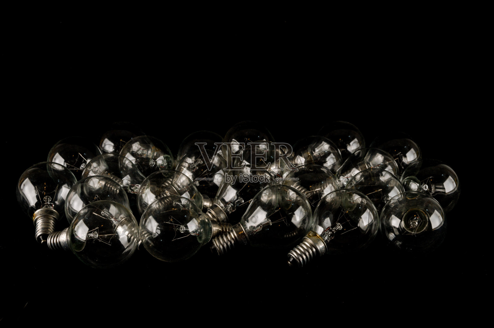 背景有很多灯泡照片摄影图片