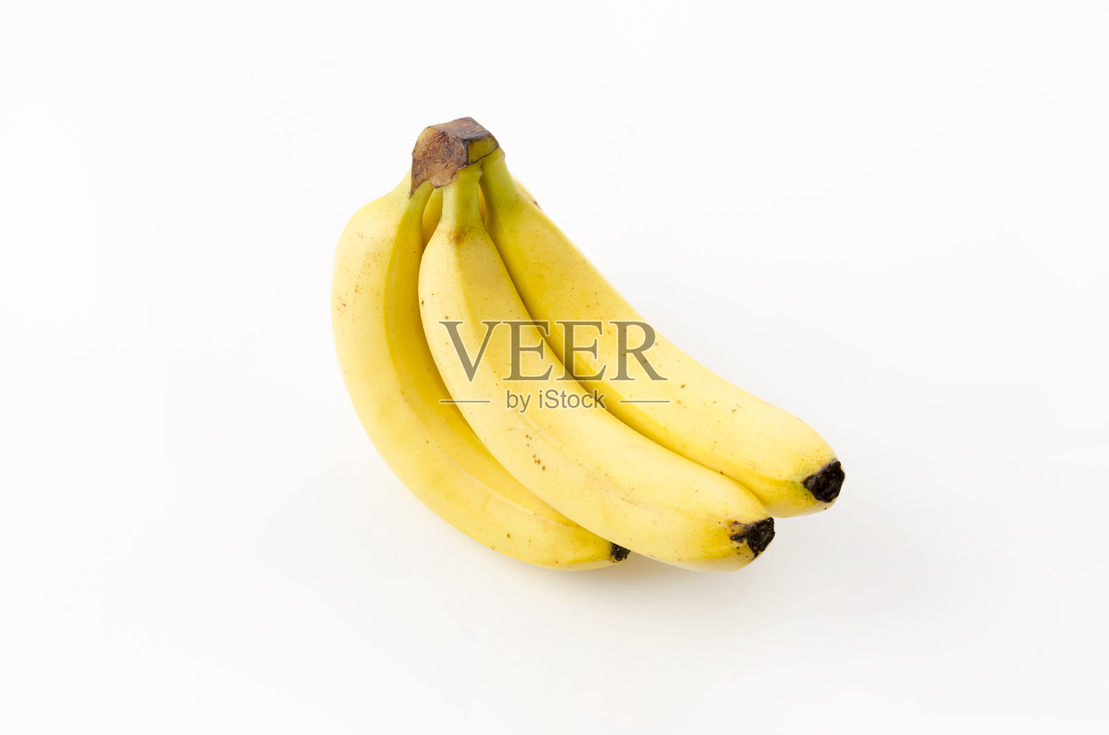 成熟的黄色香蕉在白色的背景照片摄影图片