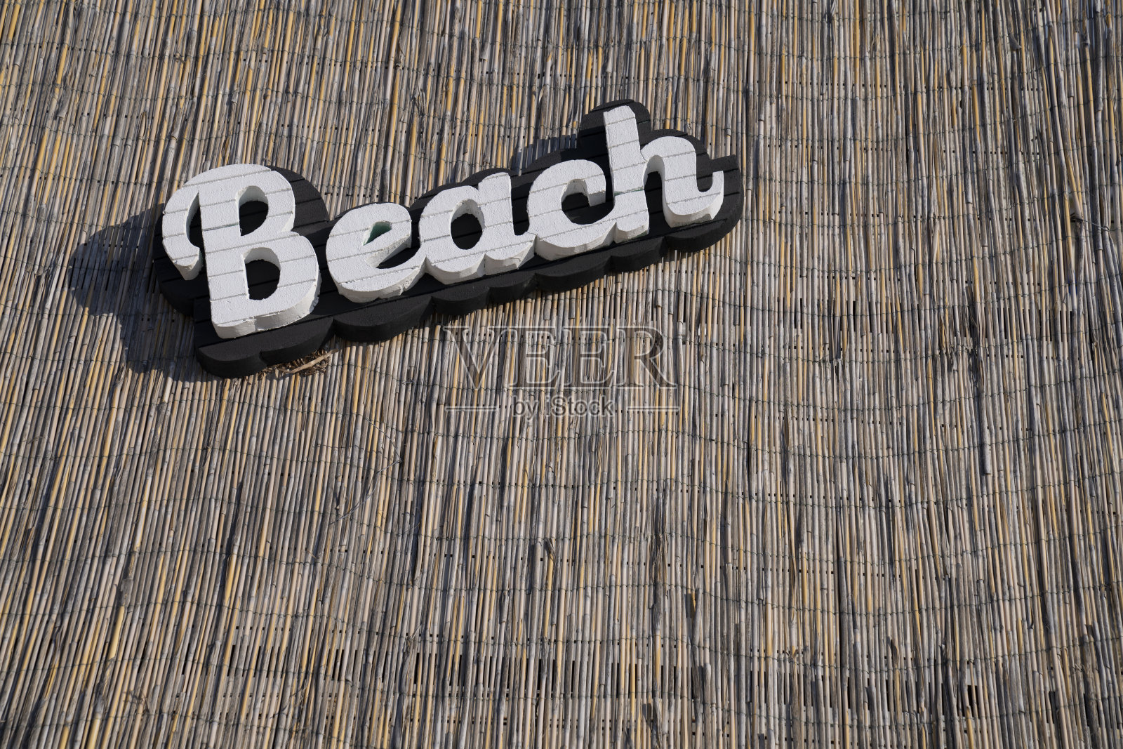 柳条上的沙滩文字照片摄影图片