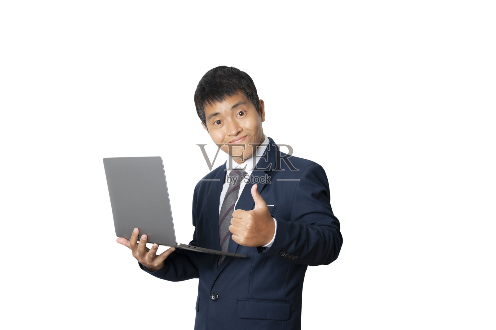 商人使用笔记本电脑的肖像。在线工作。照片摄影图片