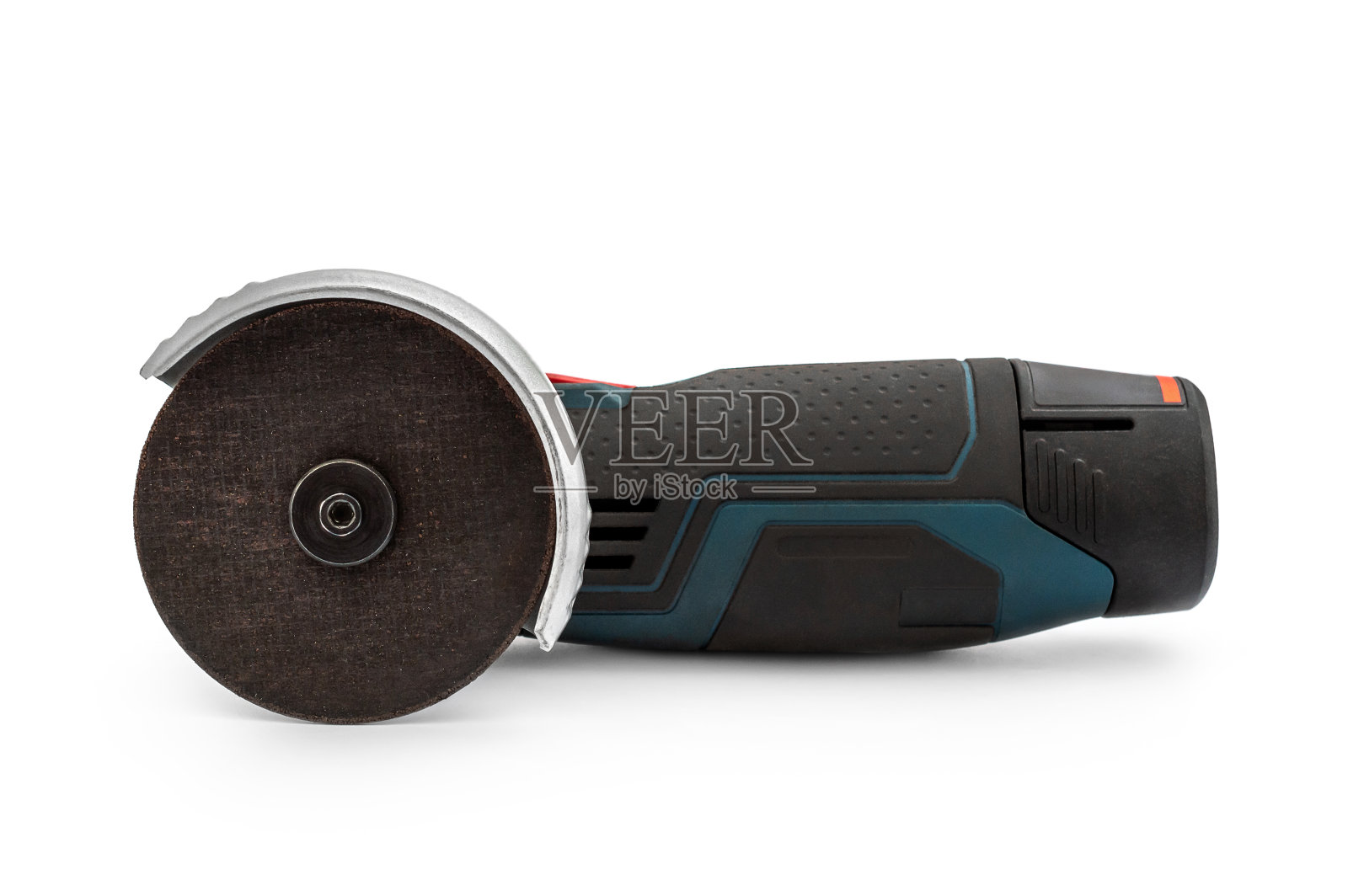 可充电角磨床上的白色背景。照片摄影图片