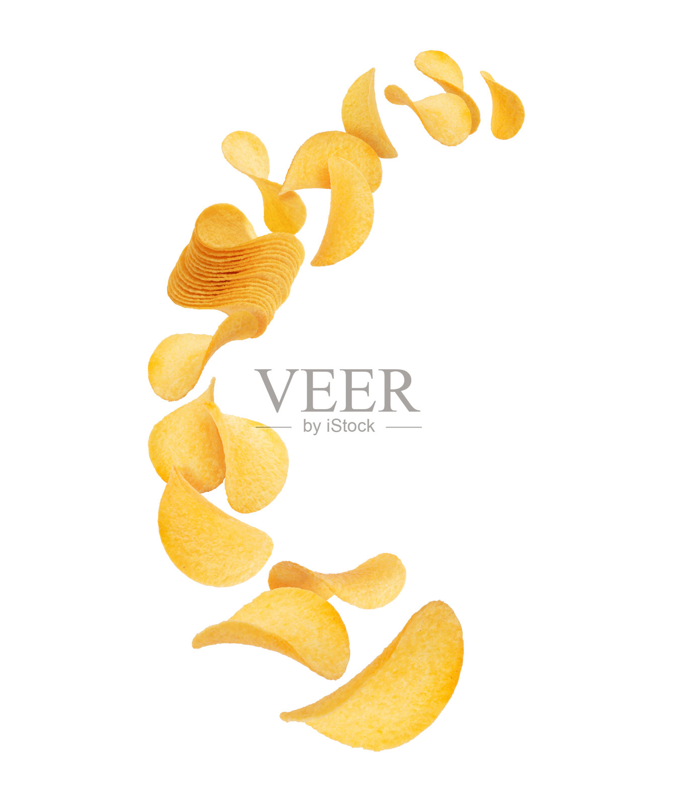 美味的薯片在空中盘旋在白色的背景上照片摄影图片