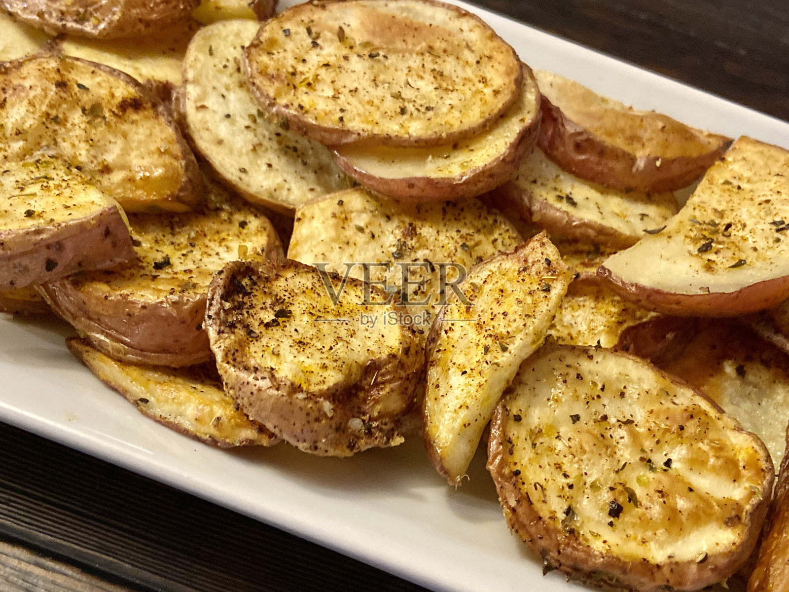 近距离烤土豆照片摄影图片