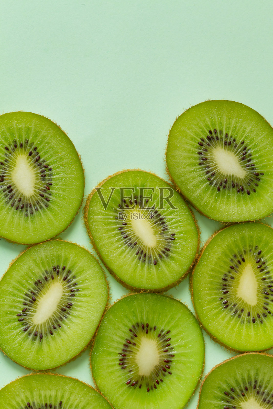 平躺顶视图，美味的猕猴桃背景。垂直的。特写镜头照片摄影图片