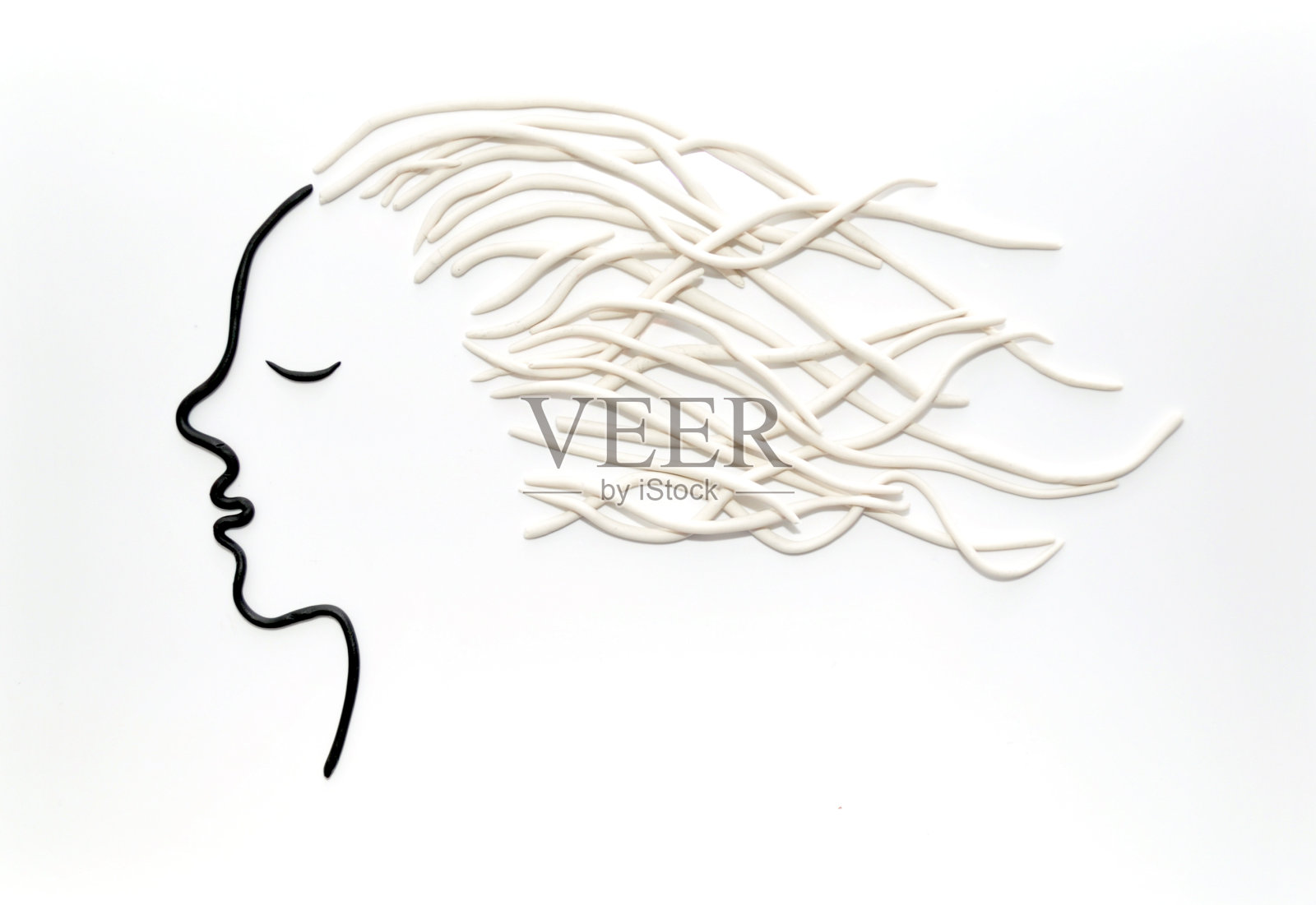 橡皮泥做的女孩的头发照片摄影图片