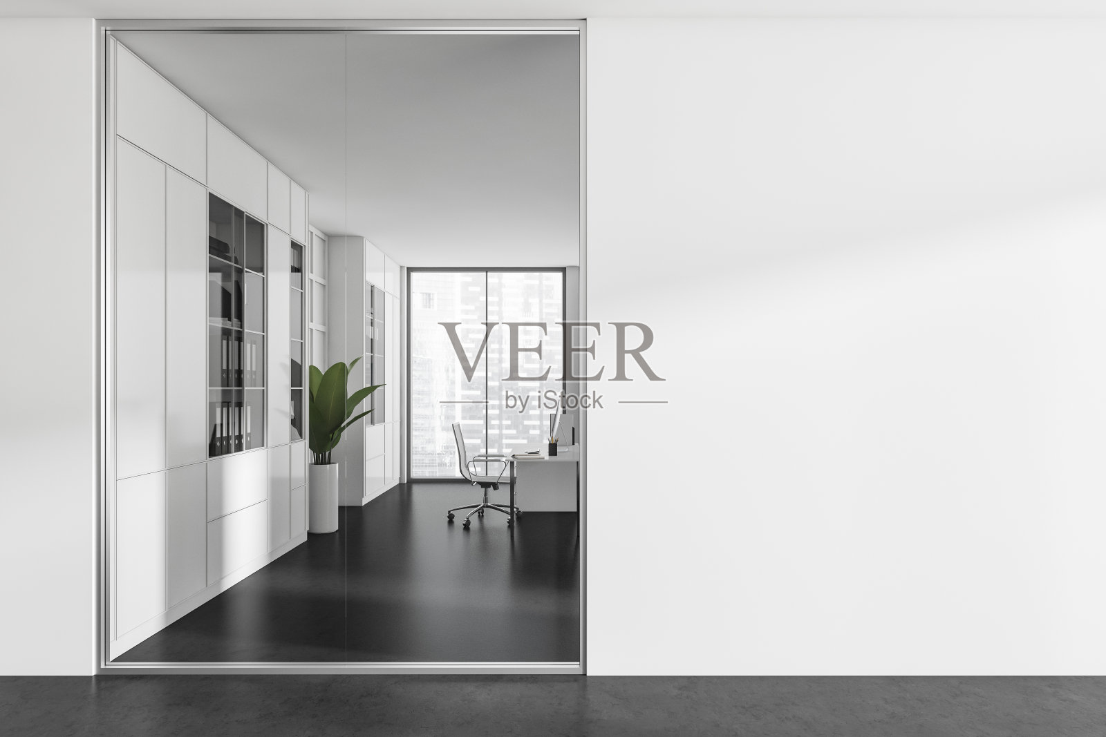 办公室内部，玻璃门后的桌椅和电脑。模型照片摄影图片