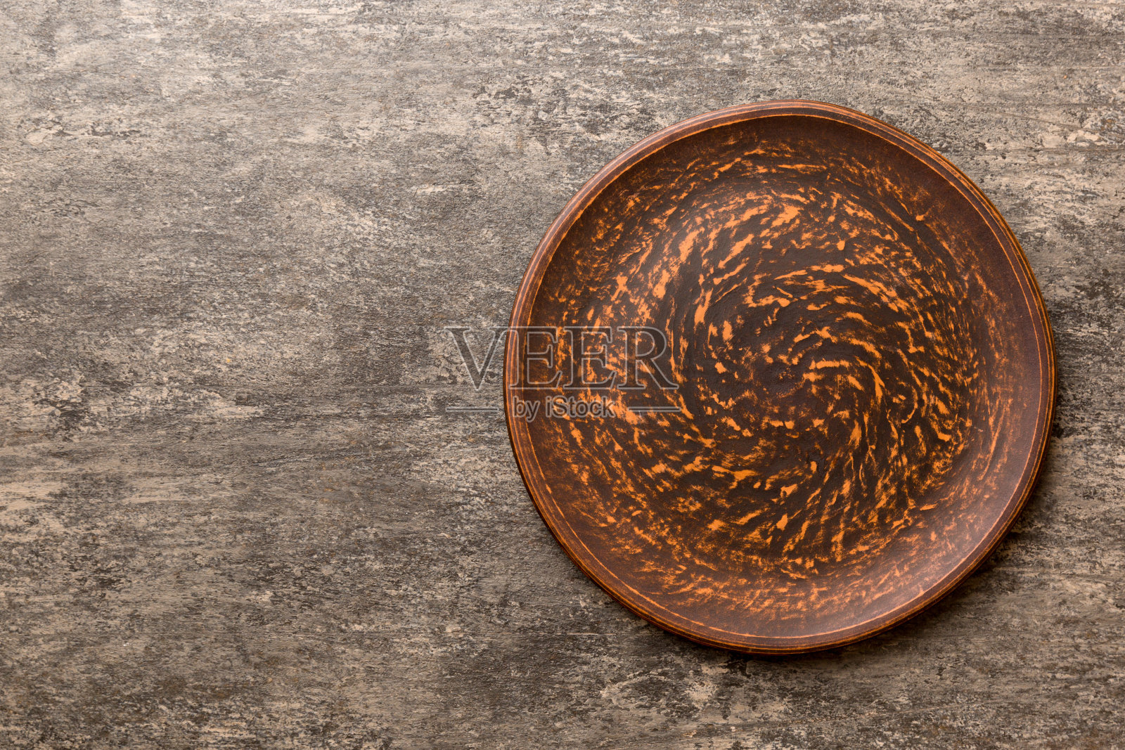 水泥背景上空板的俯视图。为你的设计留出空间照片摄影图片