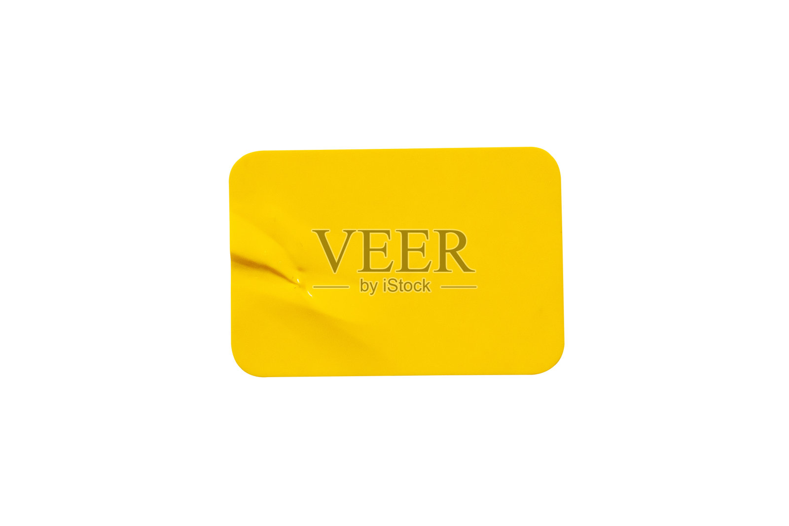 黄色塑料不干胶标签孤立在白色背景照片摄影图片