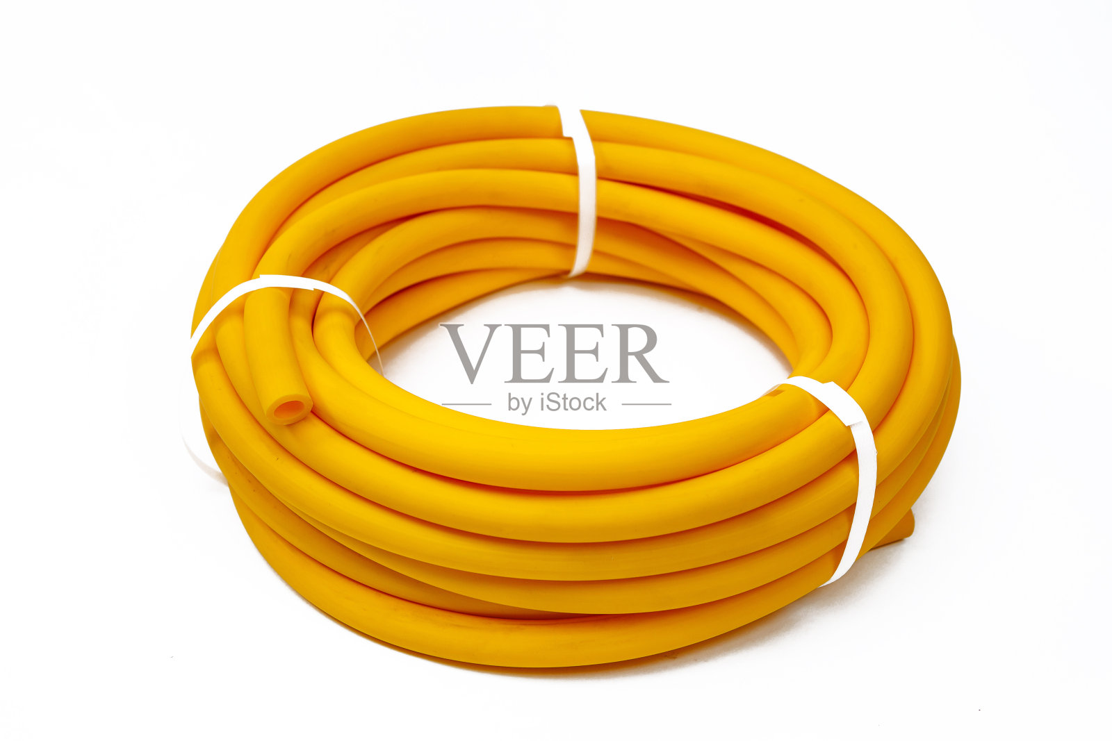 胶管:缠在线轴上并用塑料锁固定的胶管照片摄影图片