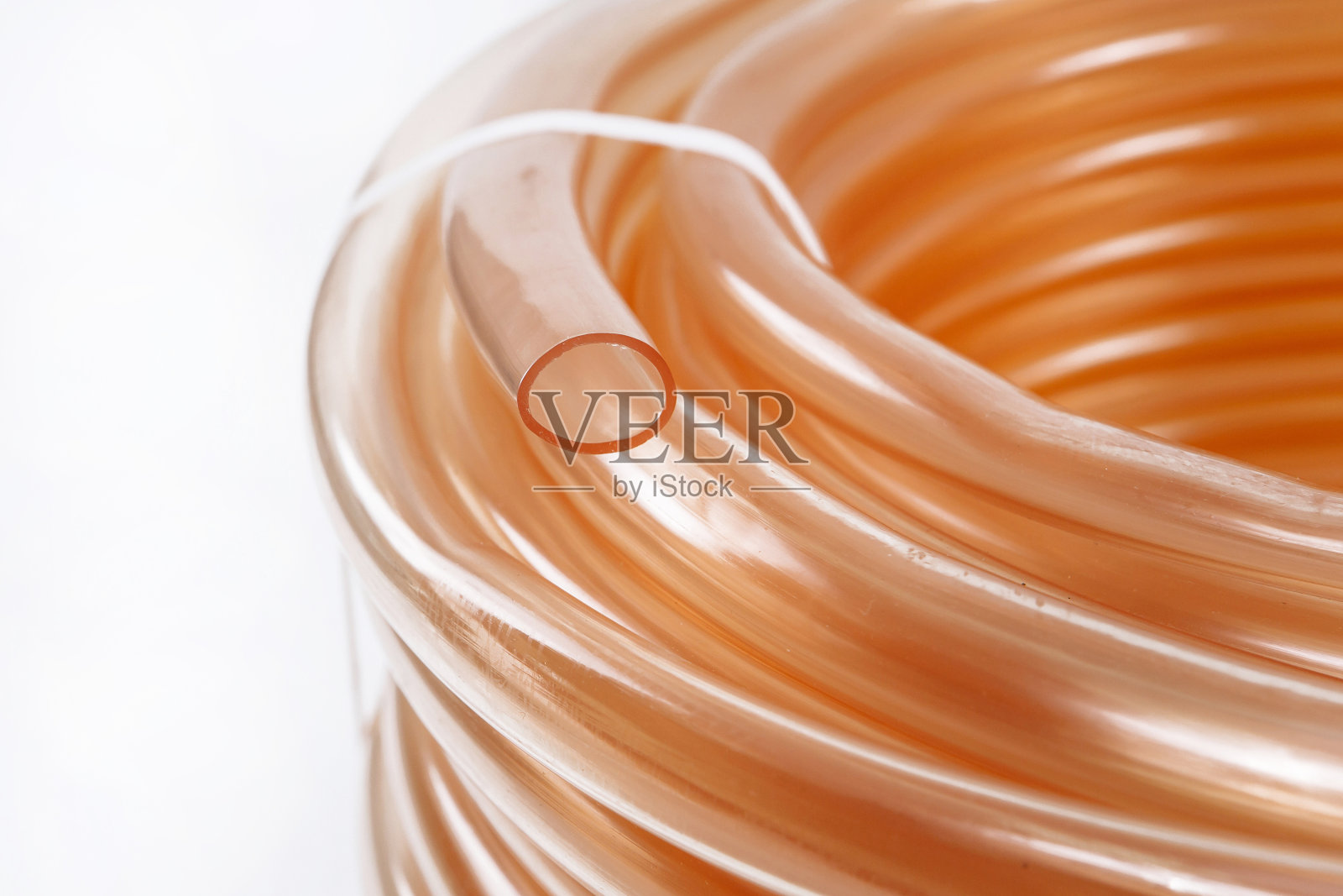 胶管:缠在线轴上并用塑料锁固定的胶管照片摄影图片