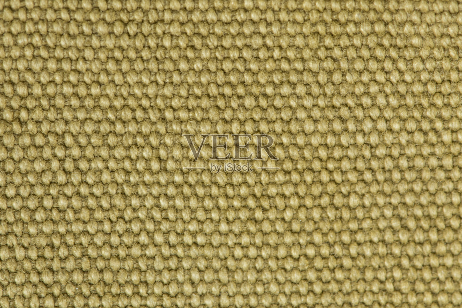 纺织军事背景。灯芯绒织物的微距照片。照片摄影图片