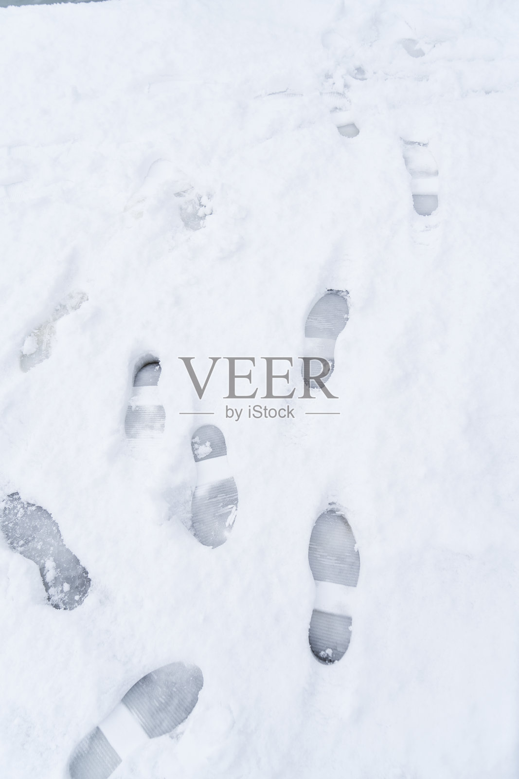 雪地上的脚印照片摄影图片