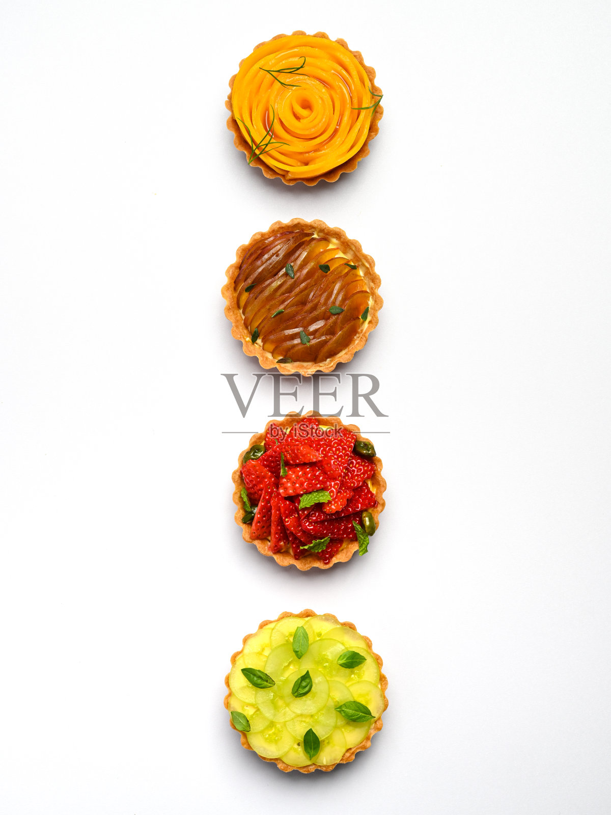 芒果，李子，草莓和葡萄甜饼照片摄影图片