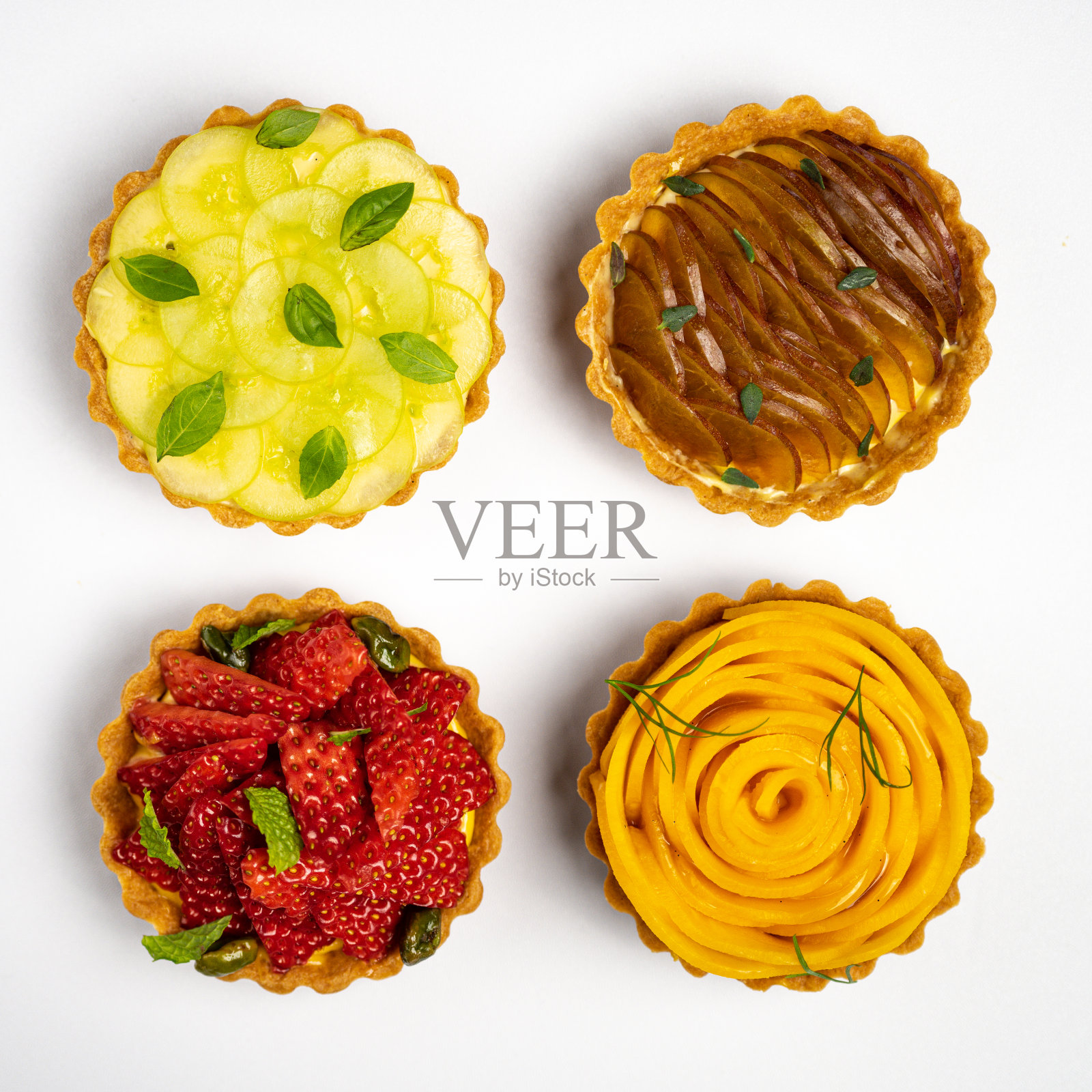 芒果，李子，草莓和葡萄甜饼照片摄影图片