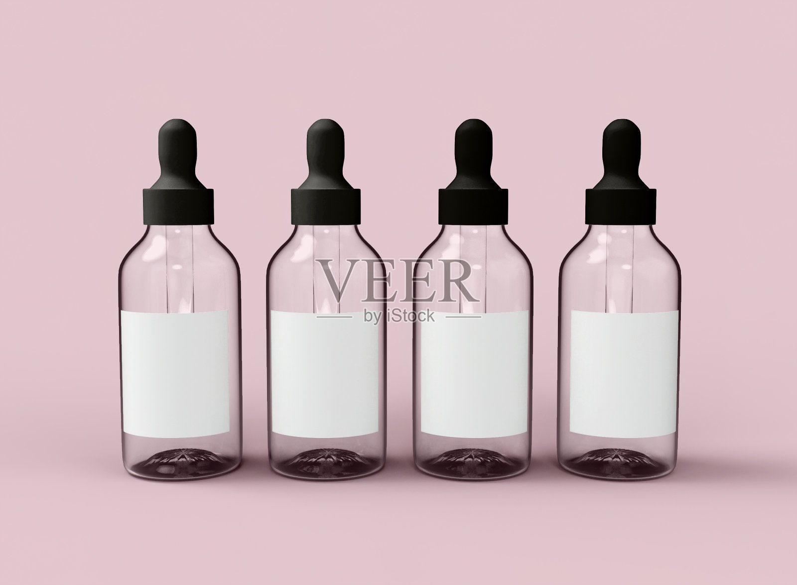 四个玻璃滴管瓶照片摄影图片