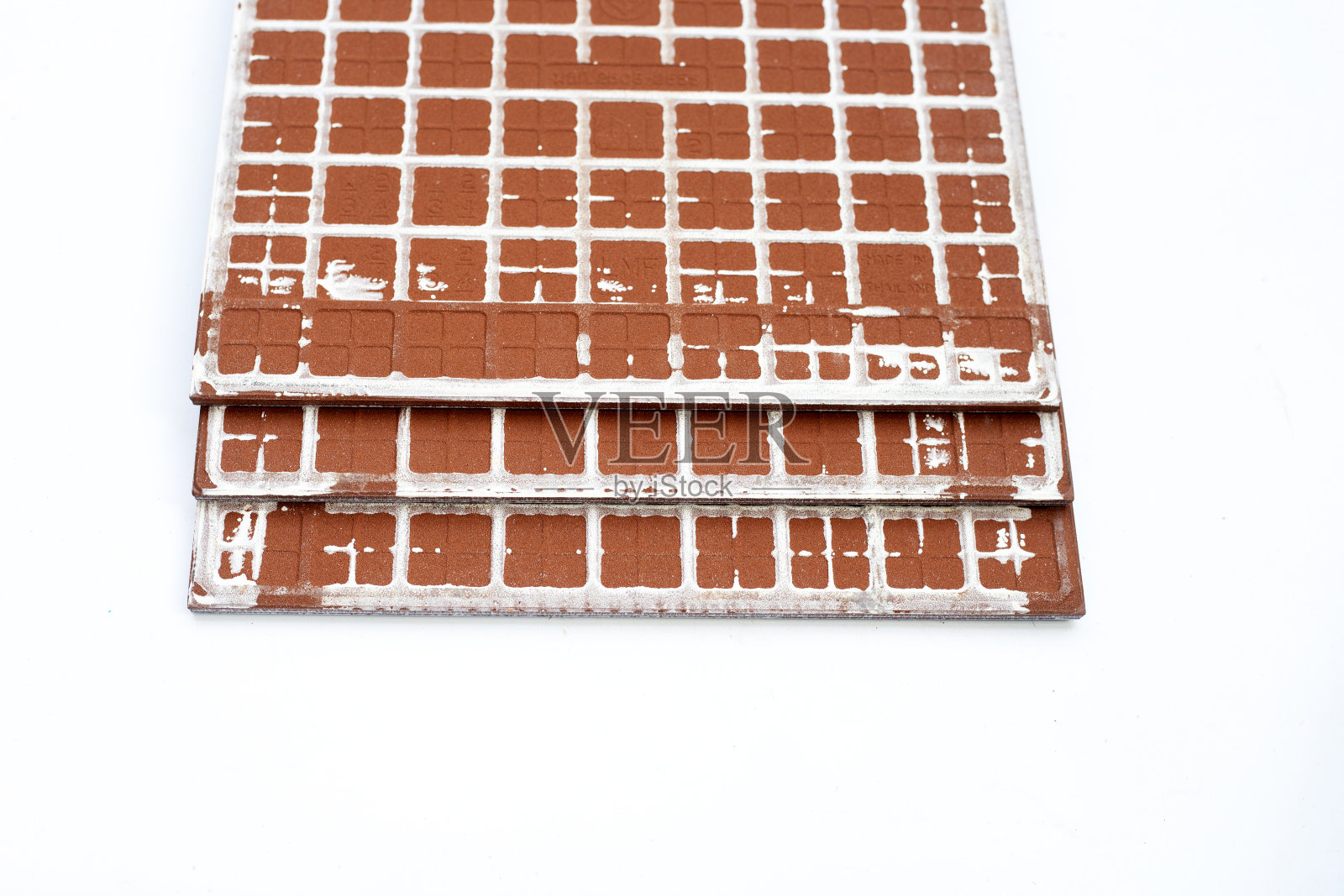 白色背景上的地砖。照片摄影图片