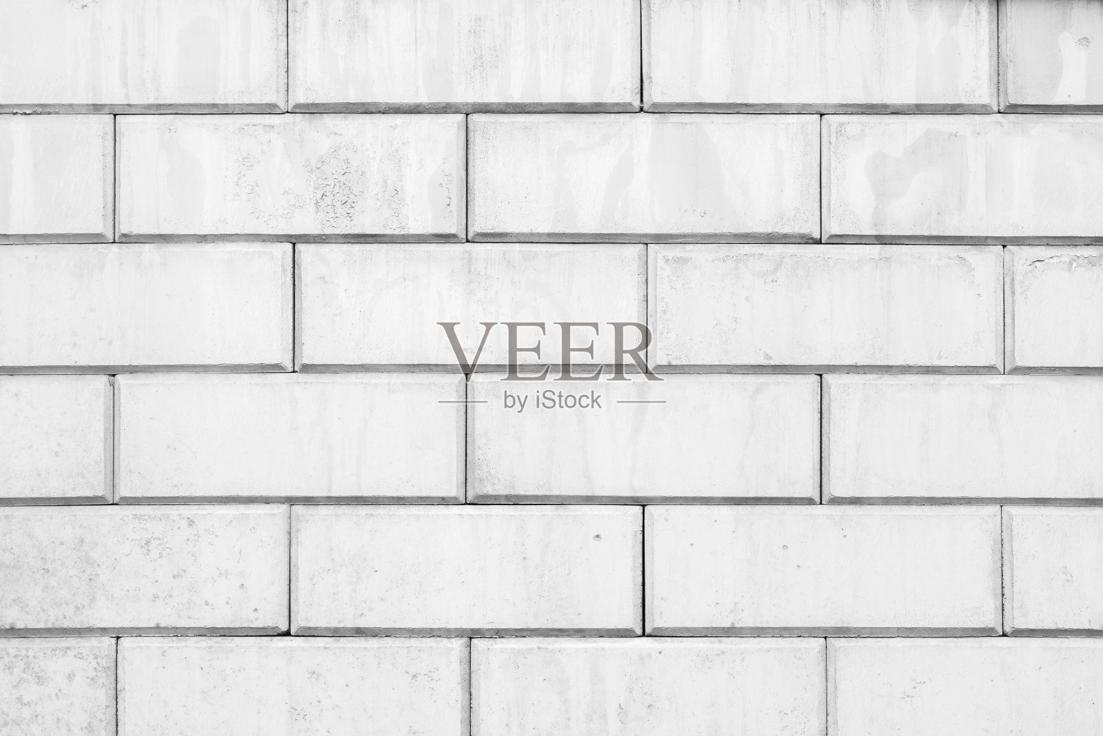 灰色石材背景的墙面纹理。照片摄影图片