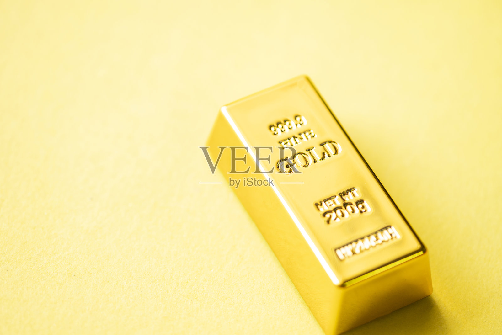 金条以黄色为背景，金条金融企业经济概念，财富和储备成功的企业和金融照片摄影图片