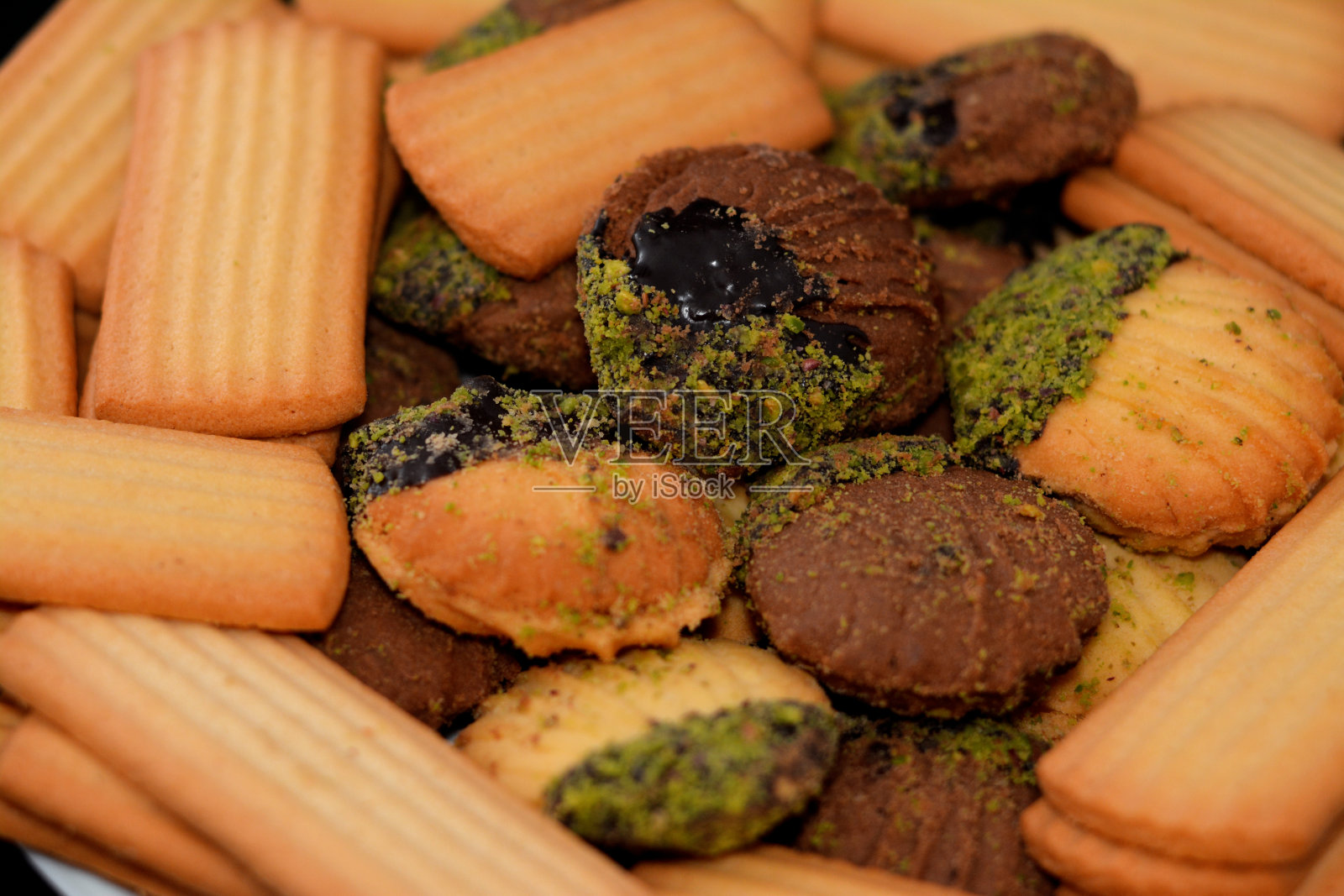 庆祝伊斯兰节日(El-Fitr)的传统阿拉伯饼干、埃及开斋节饼干和小饼干(mignardises)照片摄影图片