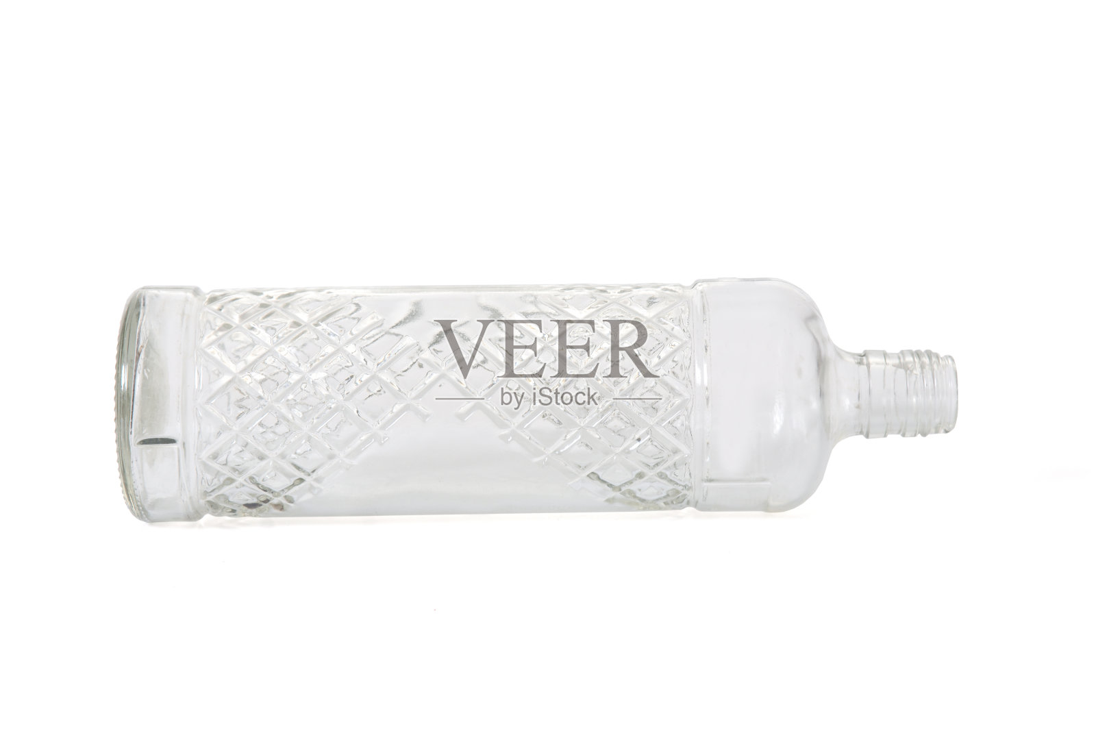 在白色背景上放一瓶照片摄影图片