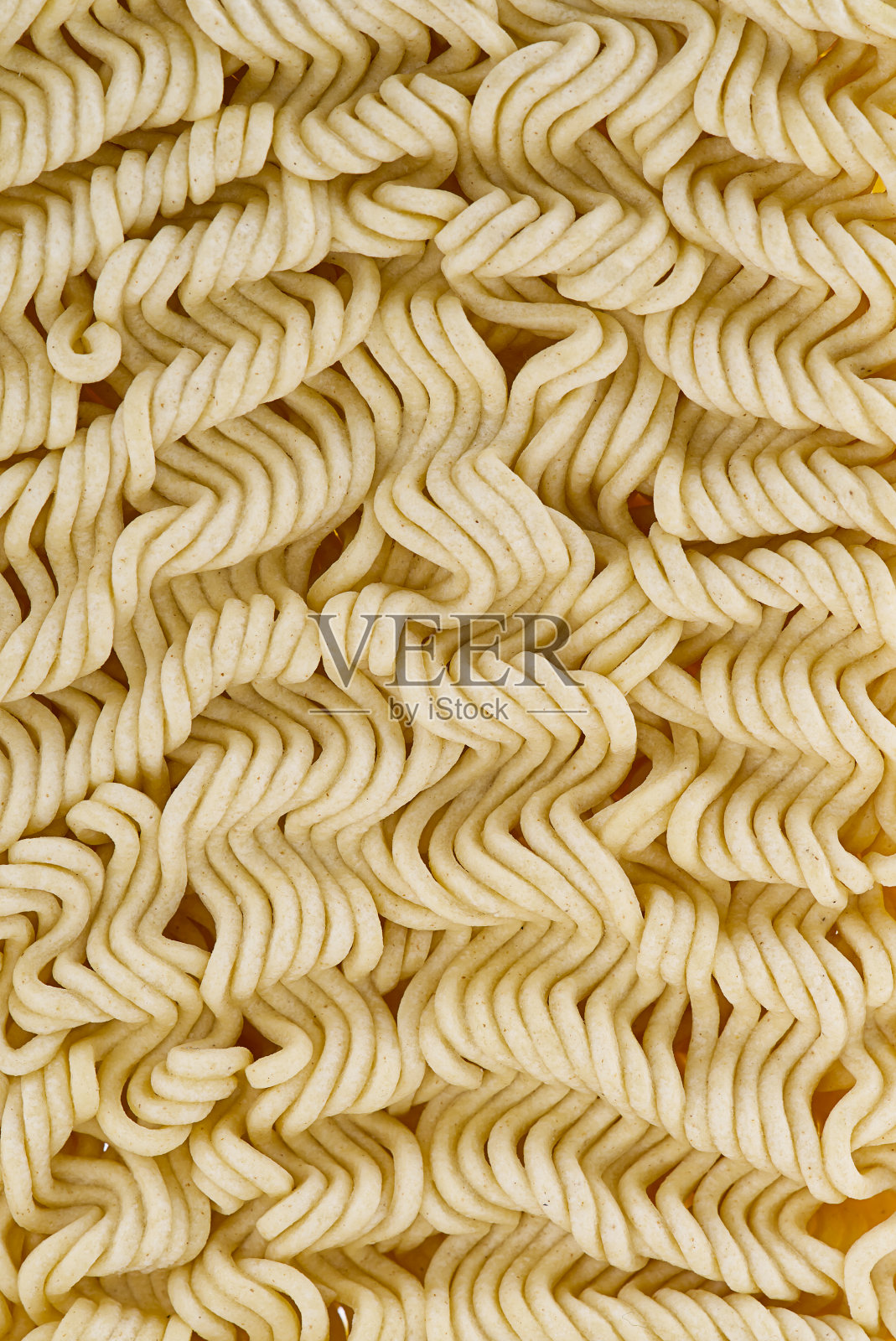 原始的方便面。关闭方便面纹理作为背景。照片摄影图片