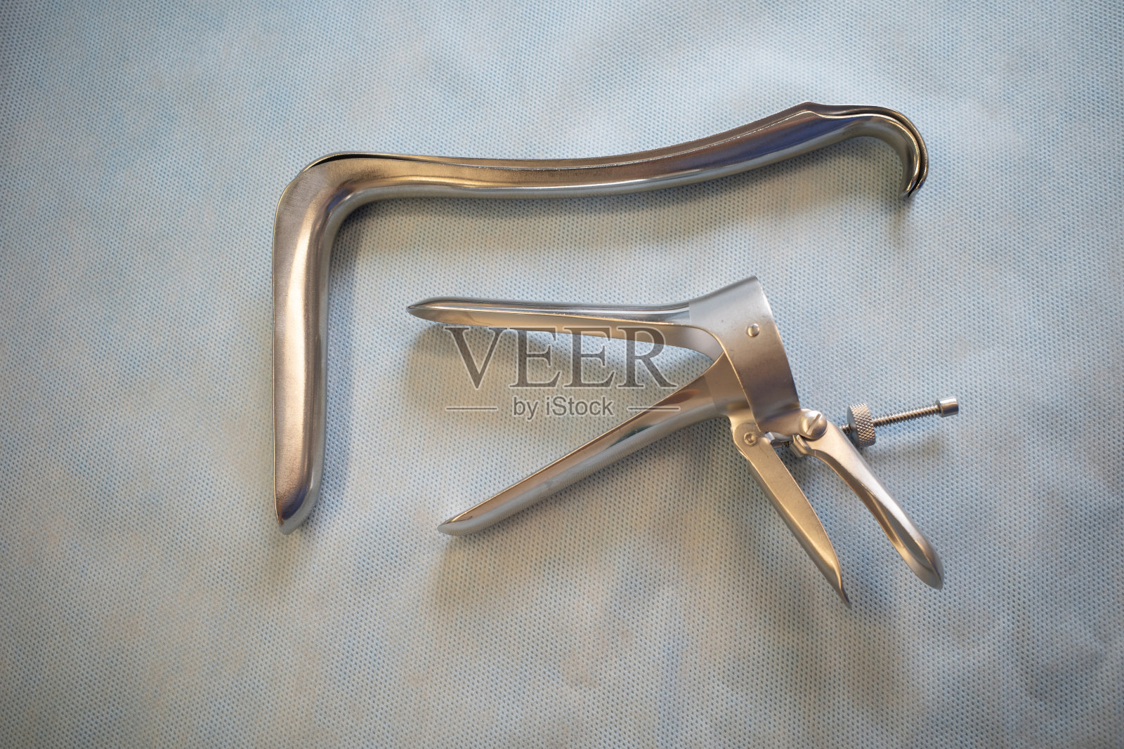 两种不同的妇科检查用窥器照片摄影图片