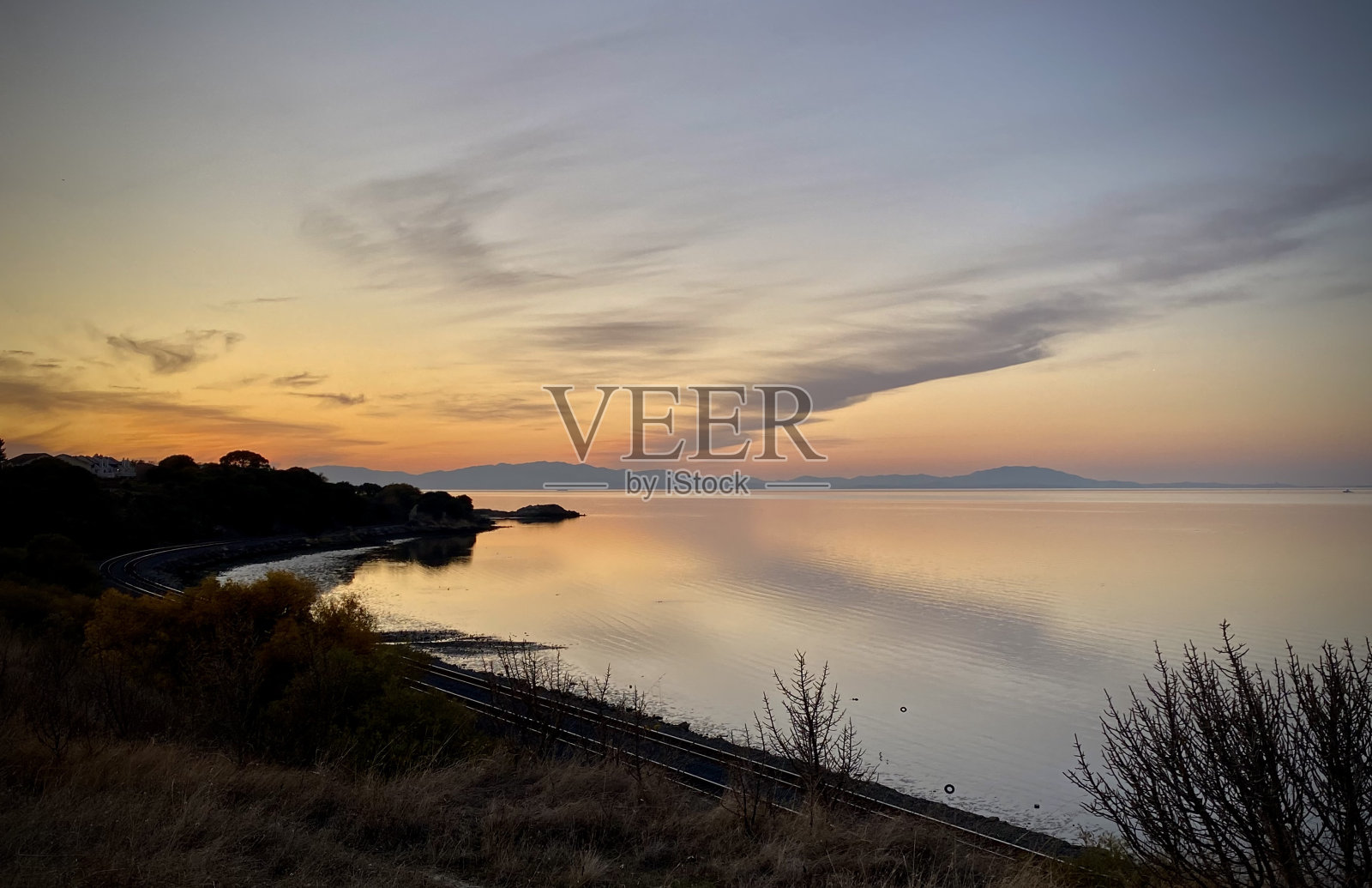 湾区日落镜照片摄影图片