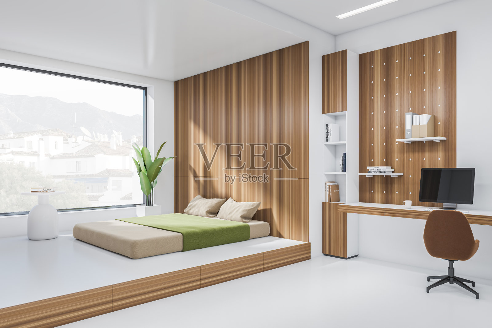 卧室内部，床和书桌，电脑，书架和窗户。空墙照片摄影图片