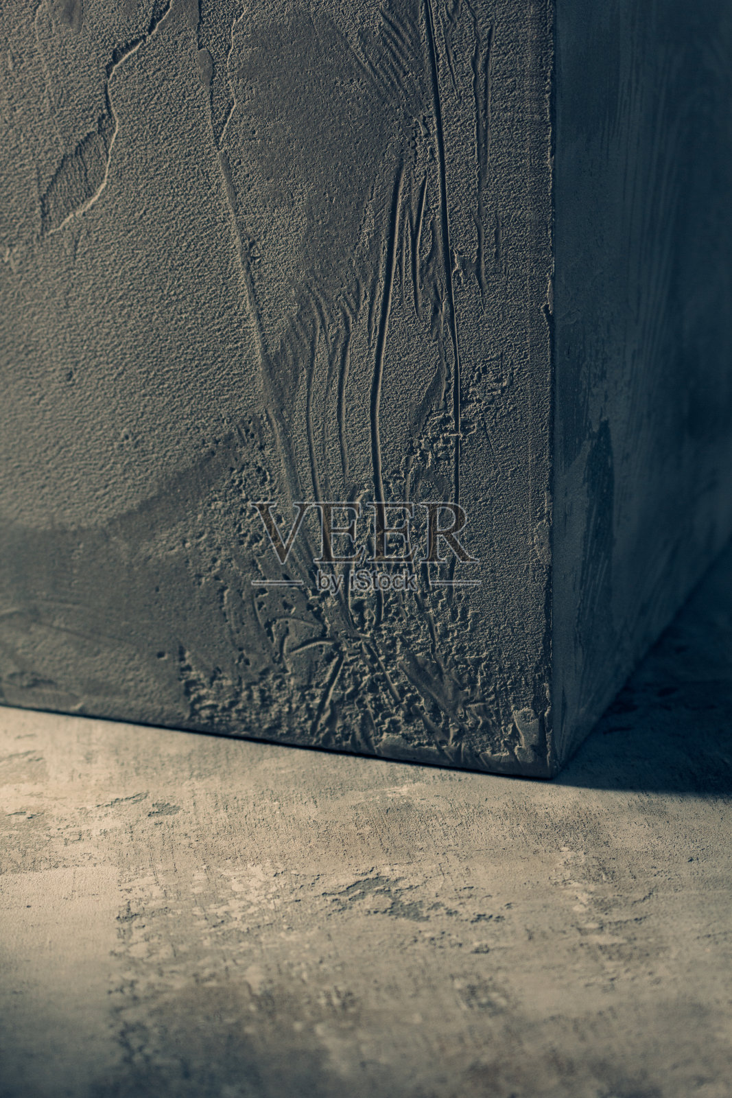 抽象水泥背景纹理上的混凝土立方体。房屋墙角照片摄影图片