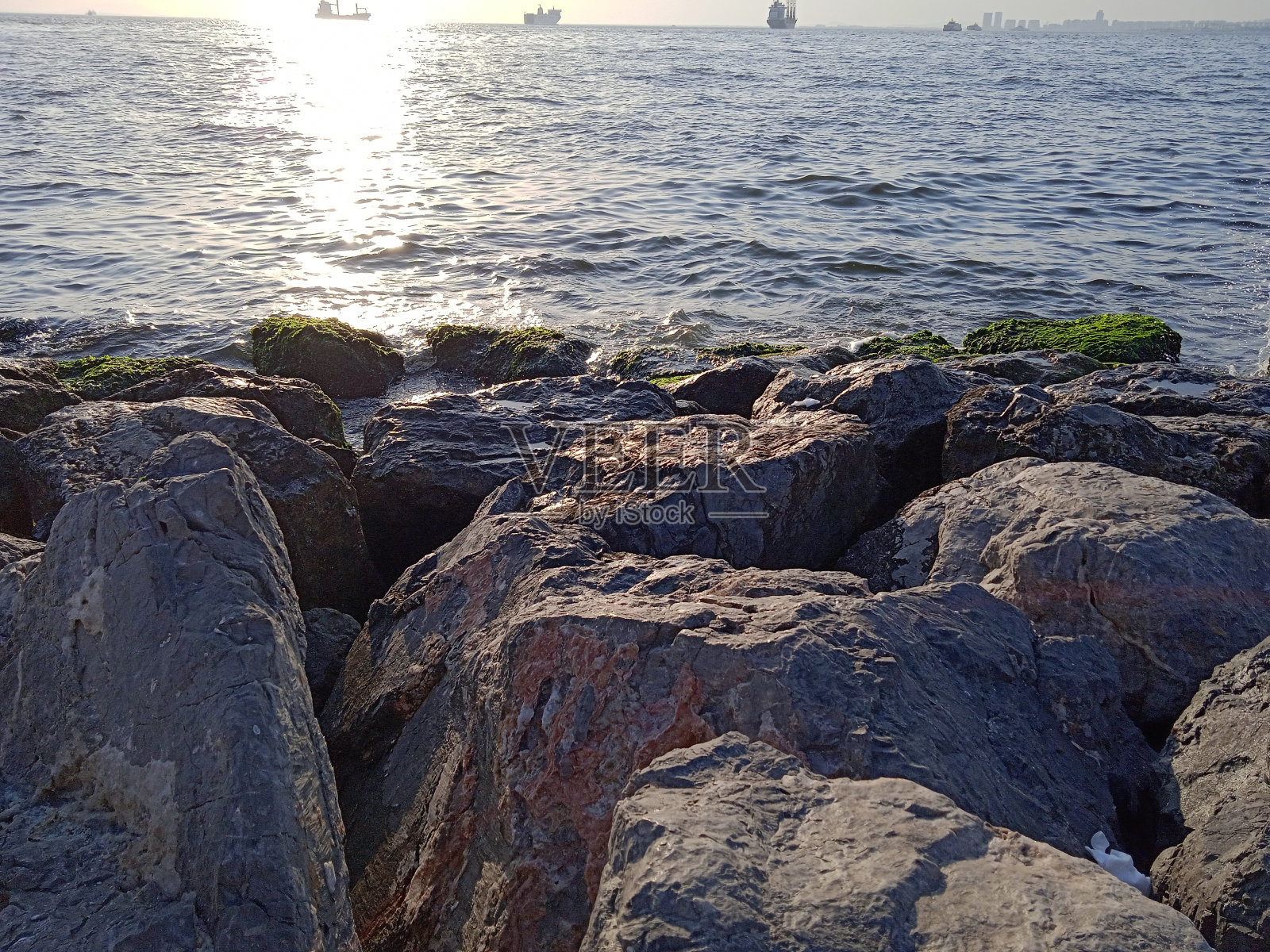 伊兹密尔海滩的日落照片摄影图片