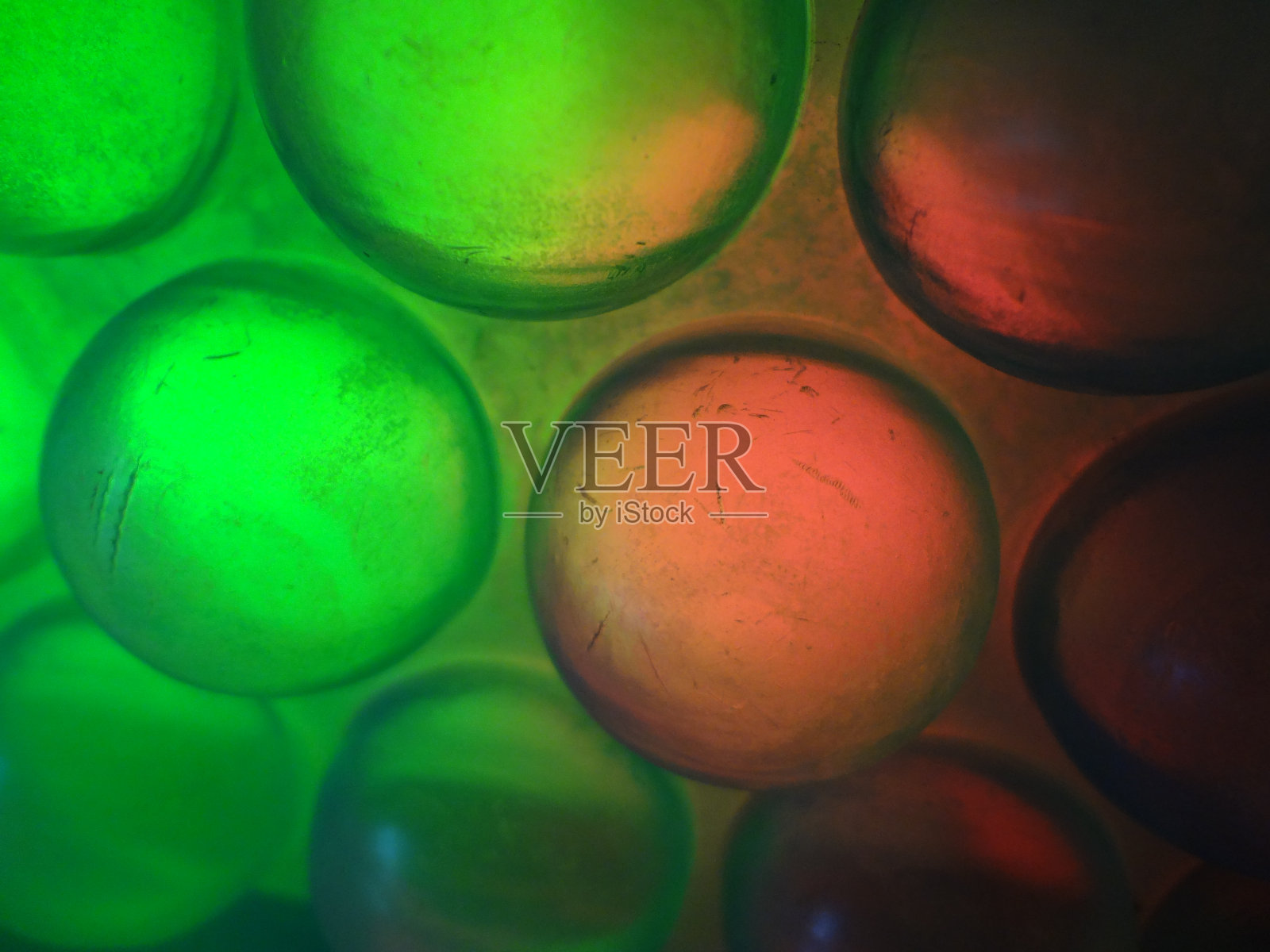 绿色橙色泡泡抽象纹理简单平滑运动散焦模糊现代背景照片摄影图片