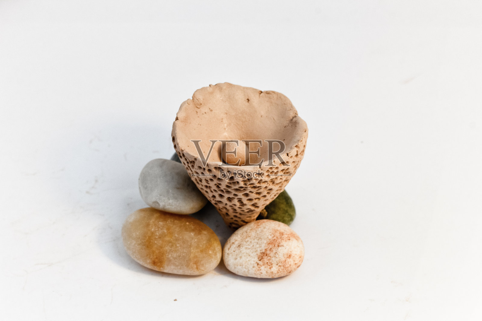 手工抽象泥塑。照片摄影图片