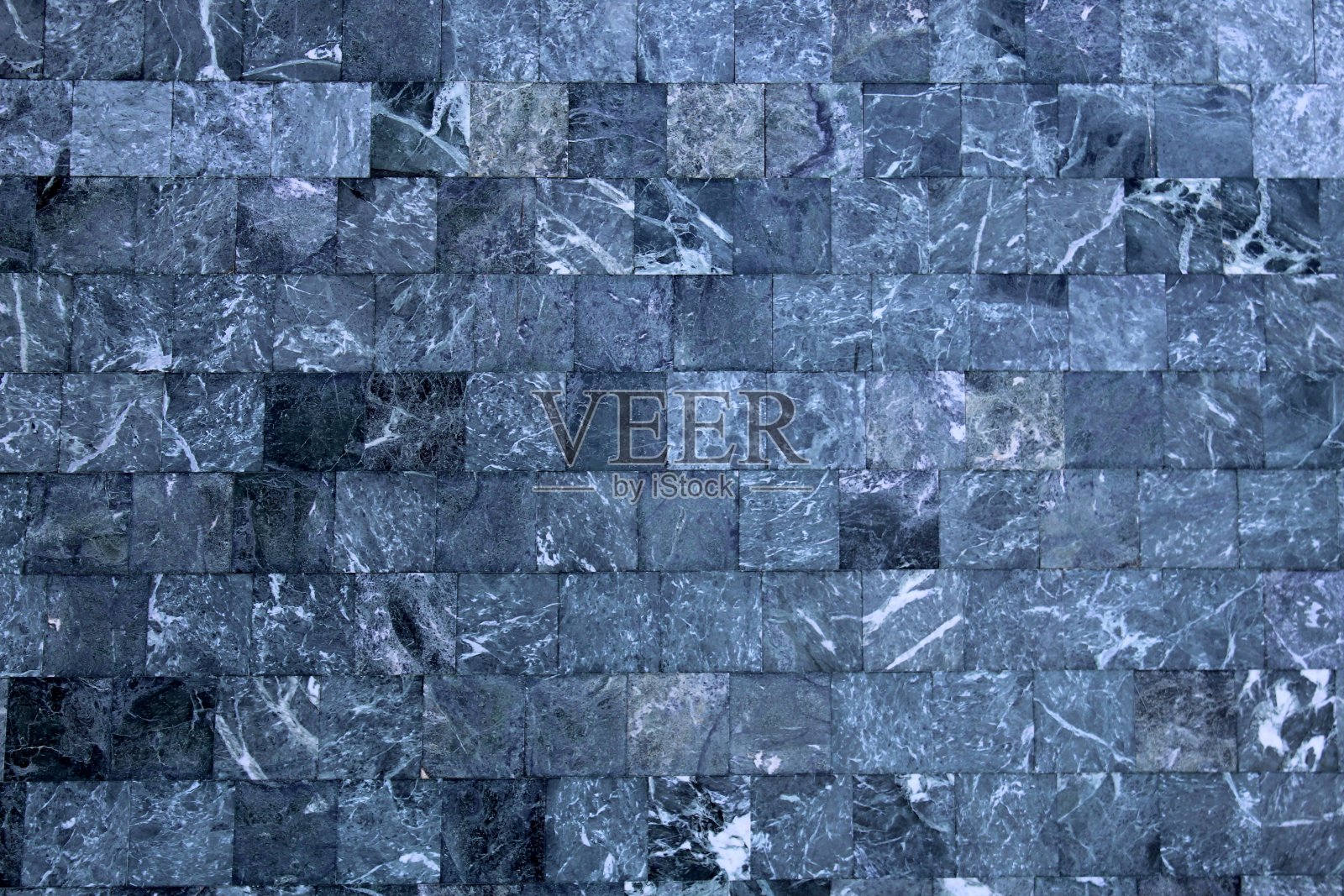 大理石纹理的绿色方形衬石。照片摄影图片