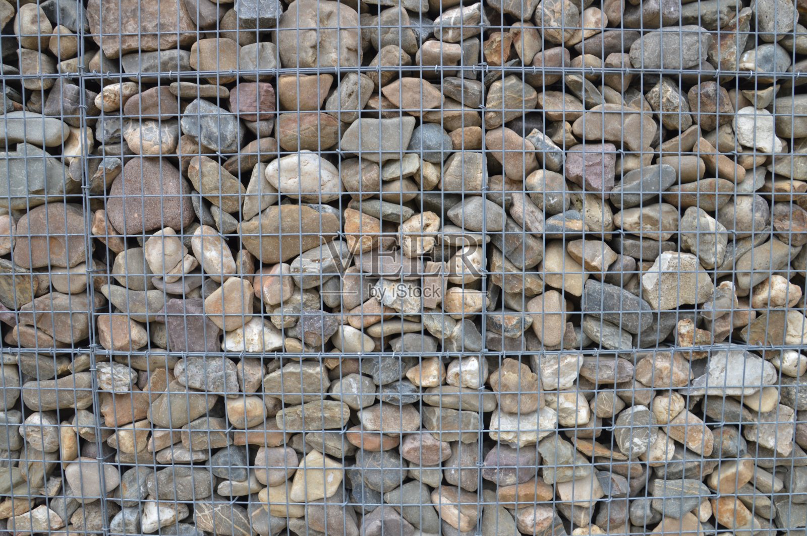 石头和铁围栏背景照片摄影图片